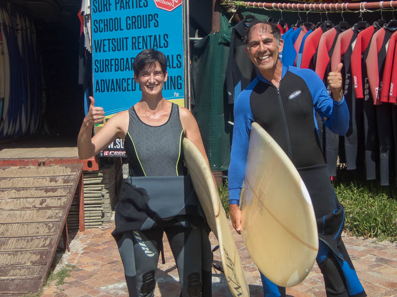 christina and bob with surfboard